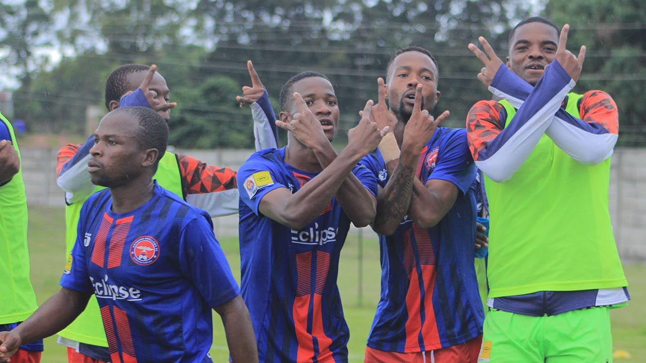 Swallows players Phumlani 'Doing' Matsebula, Sizolwethu 'Nunu' Shabalala who scored the brace, goalkeeper Bongiswa 'Romario' Dlamini celebrate after scoring their first goal as Nhlanhla Ngwenya turns back.